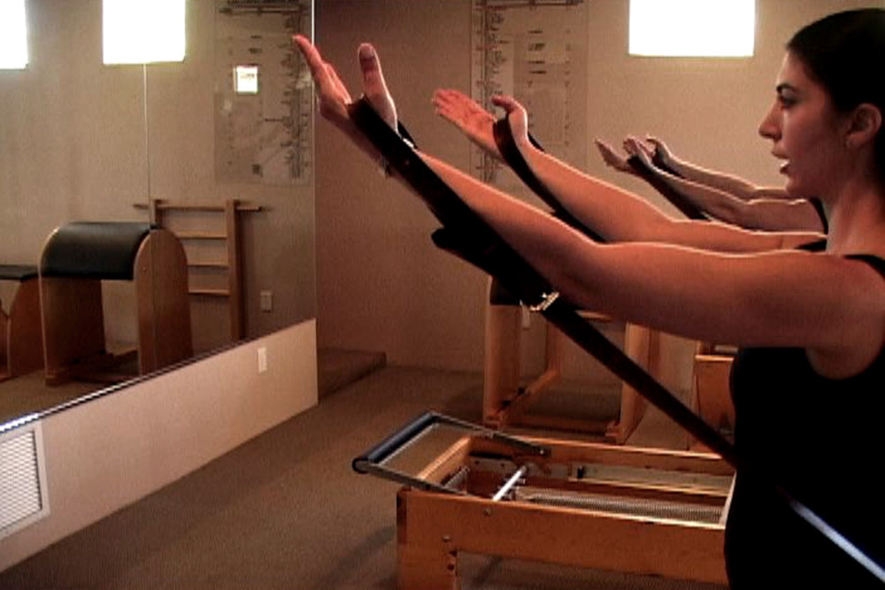 Kneeling Teaser Arms - an Advanced Reformer Pilates movement