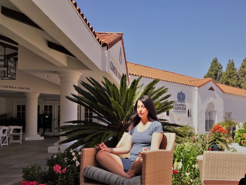 Genevieve meditating outside the Chopra Center for Wellbeing before Seduction of Spirit meditation retreat. April 2017